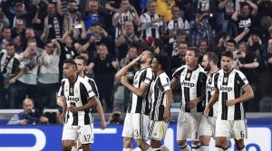 Juventus' Giorgio Chiellini celebrates scoring their third goal with team mates